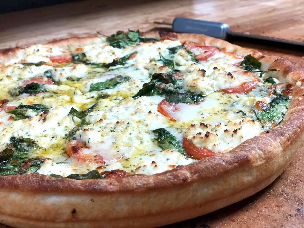 Twin Trees spinach pie with Roma tomatoes and ricotta